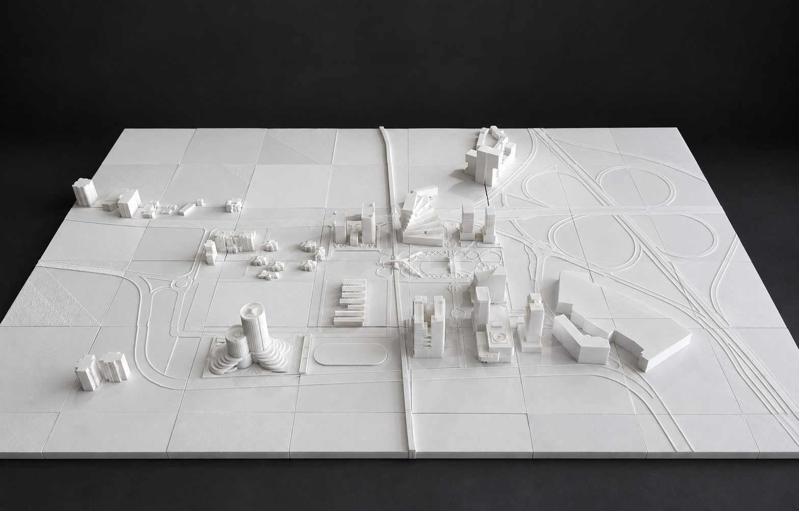 White architectural masterplan model with towers and roads